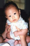 Check out the cute little Buddha baby (2� months old)